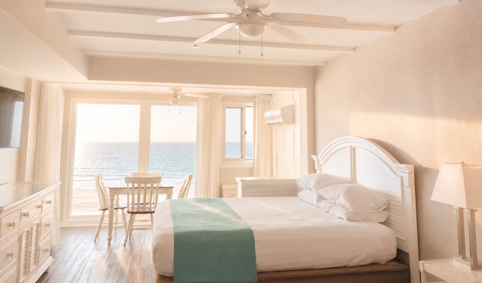 A luminous ocean-view room at the Surf Club Oceanfront Hotel in Dewey Beach